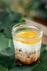 granola, coconut mousse, dates and turmeric powder healthy vegan dessert