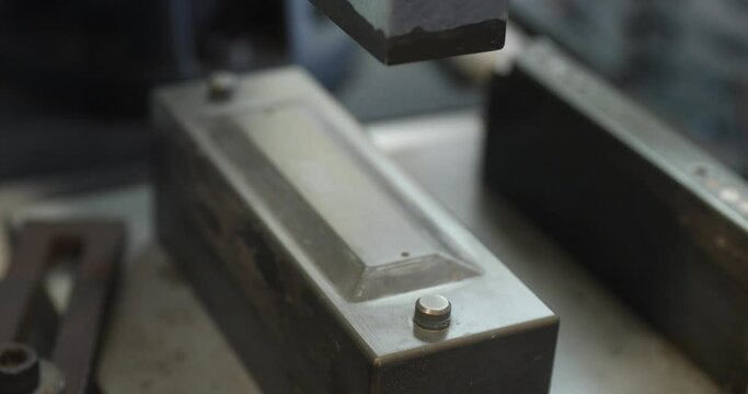 Close Up Of A Worker Operating An Ultrasonic Welding Machine In A Plastic Industry - 4K