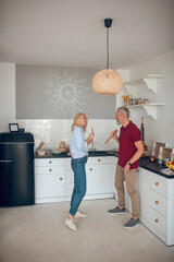 Man and woman singing and enjoying together