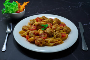 Macaroni Chicken Meatballs in marinara Sauce with Cheese Italian food