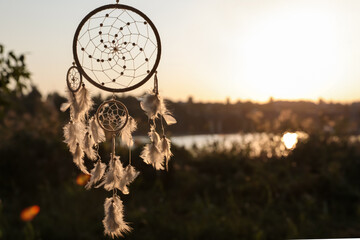 Beautiful handmade dream catcher outdoors. Space for text - obrazy, fototapety, plakaty