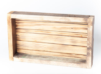 Handmade burned wooden box on a light background