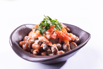 foul or ful Modammas Fava Beans Traditional Dish of Beans for all arab - White background 
