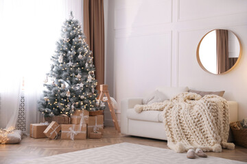 Beautiful living room interior with decorated Christmas tree and gifts