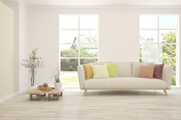 White living room with sofa and summer landscape in window. Scandinavian interior design. 3D illustration