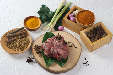 Daging kambing. Raw goat or lamb with spices and traditional herb.