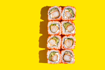 Sushi rolls california on a black background