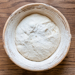 The process of raising the dough in a special basket.Banneton. Dough made from natural sourdough. Wheat dough. Fermentation.