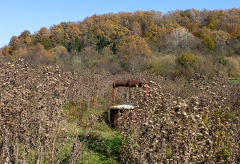 Old abandoned village well.