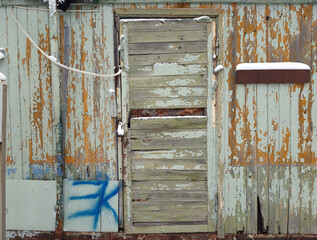 Cracked grunge close wooden texture door backdrop
