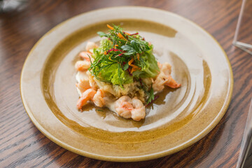 spring salad with herbs and boiled shrimps