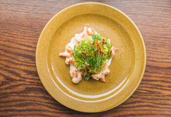 spring salad with herbs and boiled shrimps