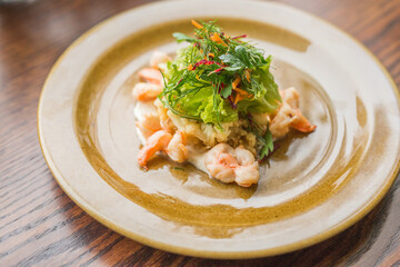 spring salad with herbs and boiled shrimps