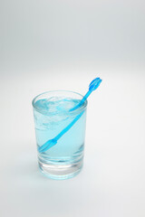 blue alcoholic drink in a decanter. Cocktail with blue gin , tonic