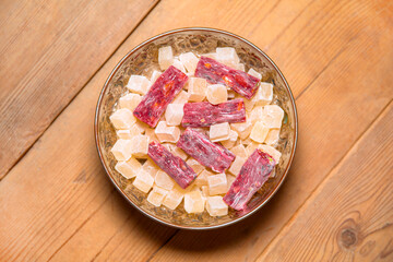 Traditional turkish delight Lokum on wooden background