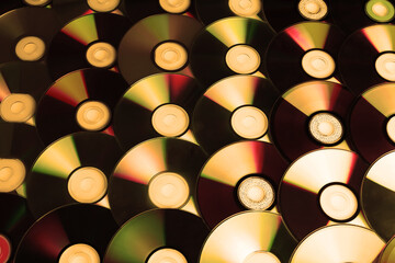 Compact CD discs collection. Background from a set of disks.