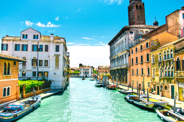 Sunny and beautiful Venice. Old colorful buildings, narrow streets and bridges. Monuments of Venice in Italy
