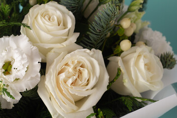bouquet of white flowers close-up and space for text.