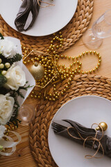 new year decor christmas table in gold tones top view.