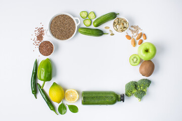 Detox cocktail from raw green fruits and vegetables and lettuce and parsley