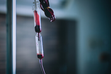 Blood transfusion in medicine patient in hospital.
