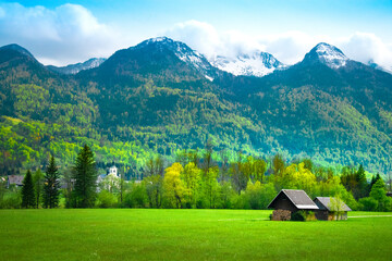 Summer in Slovenia. Mountain path. Green hills and cloudy skies. Triglav National Park, Julian...