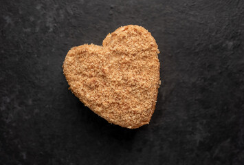 heart shaped cake on stone background