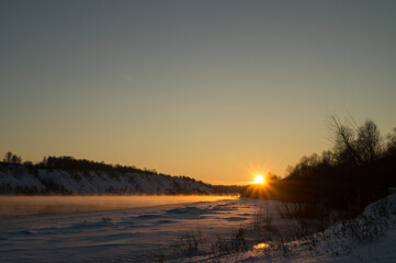 Fototapeta na wymiar The ice river at sunset. Russia, river Oka.