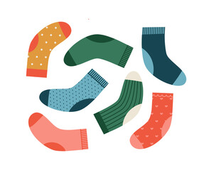 Vector illustration of the socks in different colors and print. Hand-drawn set isolated on white background. Winter holidays concept. Christmas Stockings.