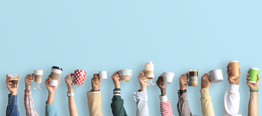 People are holding cups and paper cups of coffee. Coffee concept