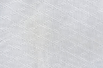 White material of a suit for practicing martial arts Judo and Aikido. Background image.