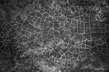 Cracked cement wall background. Grey cracked weathered concrete wall texture.