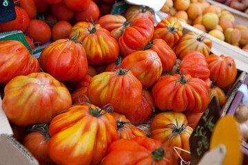 Close-up of tomatoes on display in store