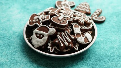 Delicious fresh Christmas decorated gingerbread cookies placed in wooden crate - Powered by Adobe
