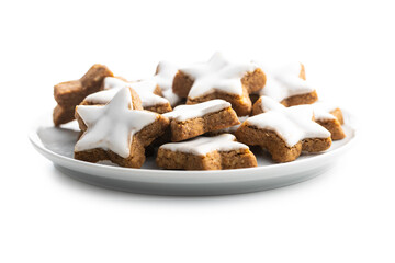Icing gingerbread stars. Traditional Christmas cookies.