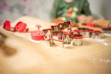 Preparing for Christmas. Gingerbread-shaped red on brown baking paper.