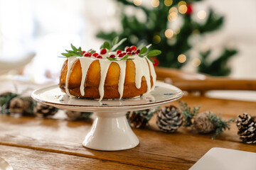 Close up of a Christmas cake with icing and berries