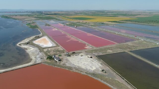 Amazing drone aerial landscape of the beautiful salt ponds, near the beach