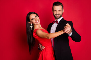 Photo of nice lady guy enjoying dancing tango toothy smile good mood isolated on red color background