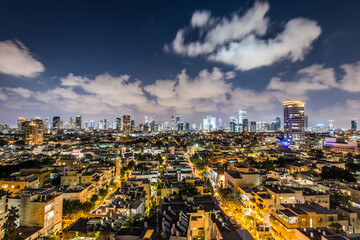 Night aerial view of Tel Aviv City with modern skylines and luxury hotels at the beach near the Tel...