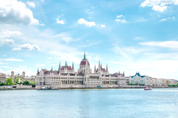 Fototapeta na wymiar The Hungarian Parliament building on the Danube River, summer in Budapest, Hungary