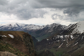 landscape with clouds on the way to the top of Kazbegi
