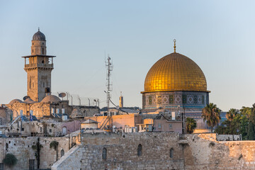 The Dome of the Rock, or called Qubbat al-Sakhra,  and Bab al Silsila Minaret under sunset,  an...