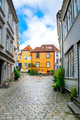 Fototapeta na wymiar Old town, beautiful street in Bergen Norway, wooden houses in Bergen - architecture background