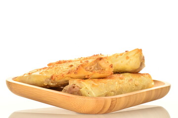 Homemade apple mini strudel, close-up isolated on white.