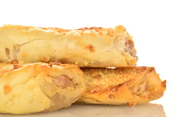 Homemade apple mini strudel, close-up isolated on white.