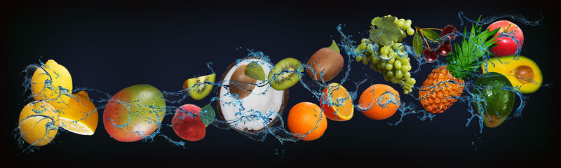 Panorama with fruits in water - juicy lemon, mango, peach, kiwi, orange, grape, annas, avocado,...