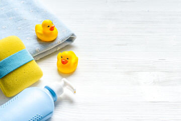 Baby accessories for bath with care products and rubber duck