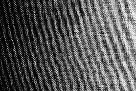 Abstract cloth background in black and white. A seamless texture in a low key. © Azazello