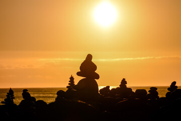 Stack of stones on the sea beach